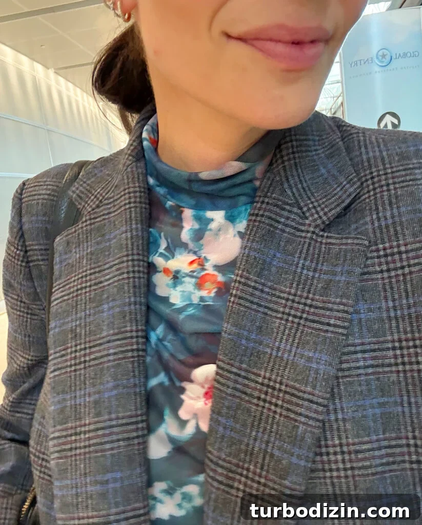 Packing Light for Italy: My Proven Minimalist Travel Wardrobe 7 Close Up Of Floral Mesh Shirt Under Tweed Blazer