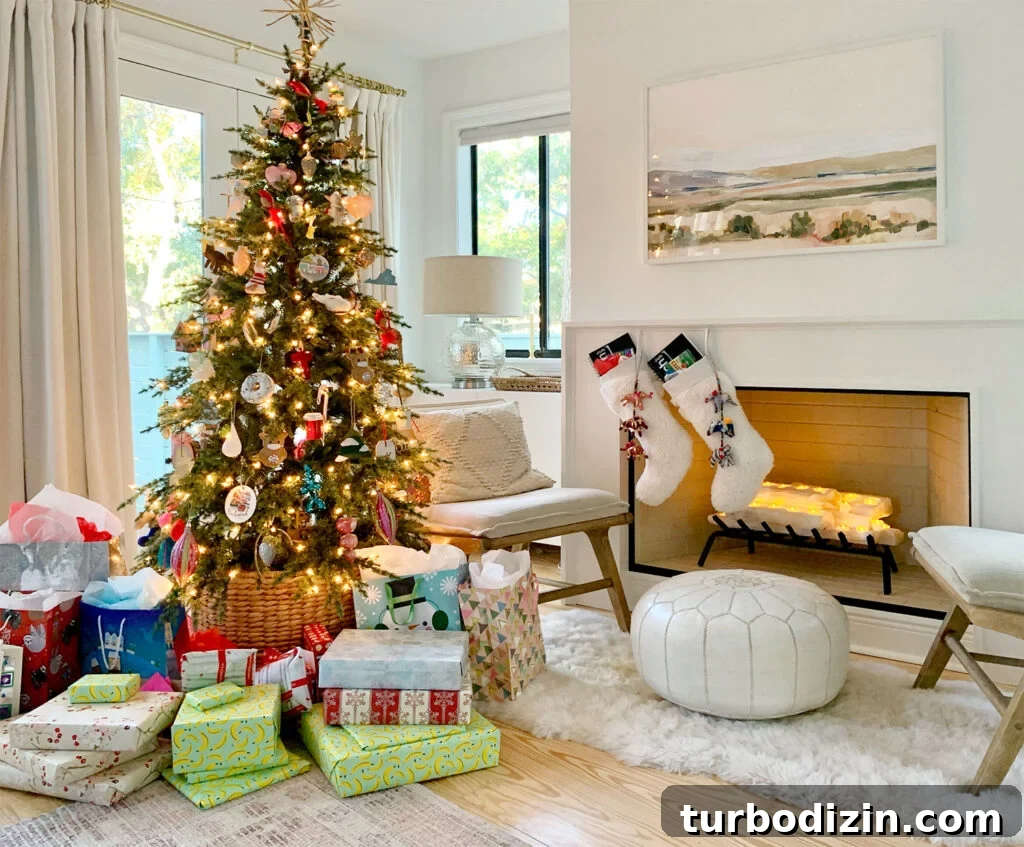 25 Creative Holiday Gift Exchange Theme Ideas to Try This Year 2 Christmas Tree In Bedroom. Next To Fireplace With Gifts Under
