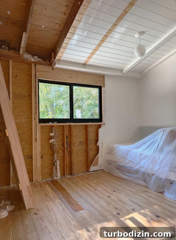 Mid-Renovation Update and Video Tour of Our Home 7 View of Sons Room With Wider Wall During Renovation