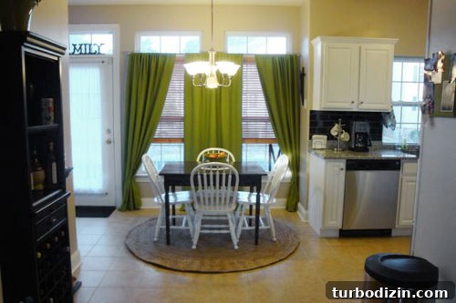 18 Expert Tips for Properly Hanging Curtains and Blinds 12 kitchen breakfast nook with rich green curtains on two windows