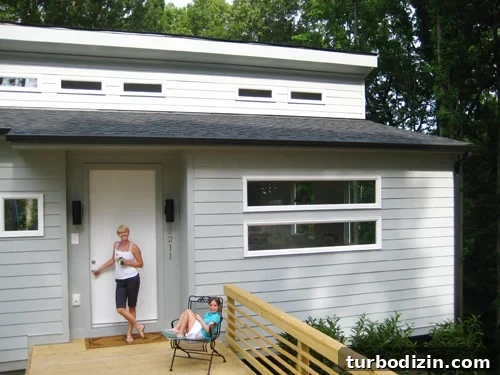 emshouseexterior Exterior of Emily's house with front deck