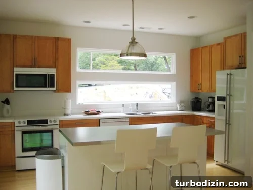 emskitchen Modern kitchen with island and pendant light