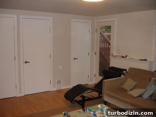 Family Room Makeover: Transform with a Green Rug and Cozy Accents 3 family-room-den-basement-before-photo