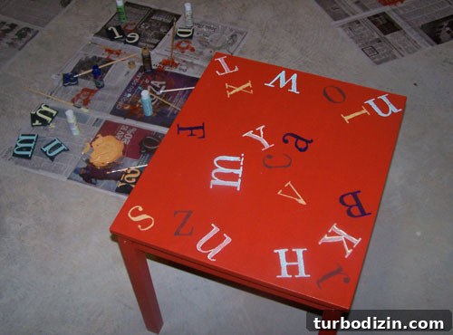 Paint Transformations: How to Refinish a Kids’ Table and Chairs 3 Kids table during stamping process