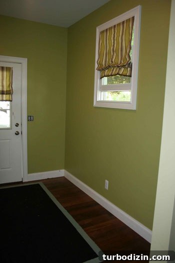 DIY Mudroom Wall with Hanging and Shoe Storage Ideas 2 Entryway before makeover