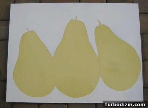 DIY Pear Painting: Step-by-Step Guide for a Charming Art Project 7 Filled yellow pears