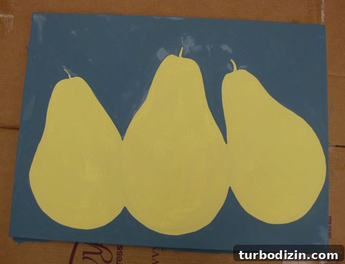 DIY Pear Painting: Step-by-Step Guide for a Charming Art Project 8 First coat of blue background