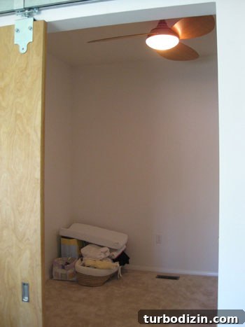 Modern Nursery Makeover for a Little Boy: Stylish Room Reveal 3 nursery-other-angle-emily-before-pictures-young-house-love