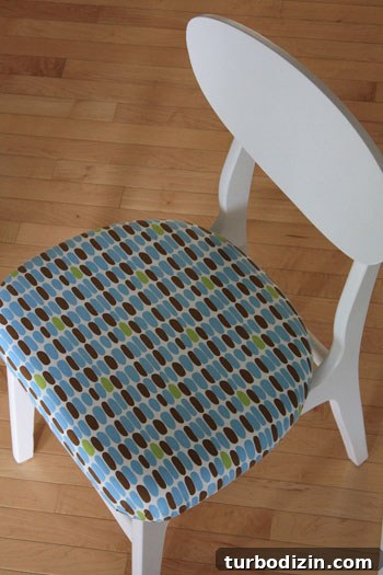 How to Paint and Reupholster a Wooden Chair for a Fresh Look 3 Chair after makeover front view