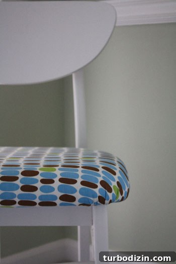 How to Paint and Reupholster a Wooden Chair for a Fresh Look 4 Chair after makeover side view