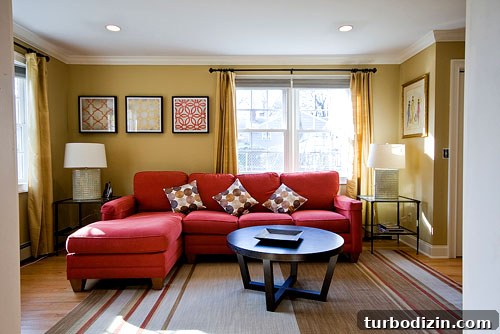 Abbey’s Living Room Makeover Featuring a Bold Red Sofa 5 Family room after 1
