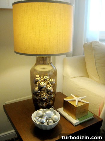 Lamp base filled with ornaments