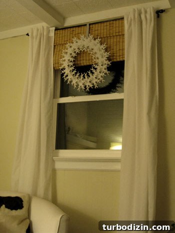 Snowflake wreath in window detail