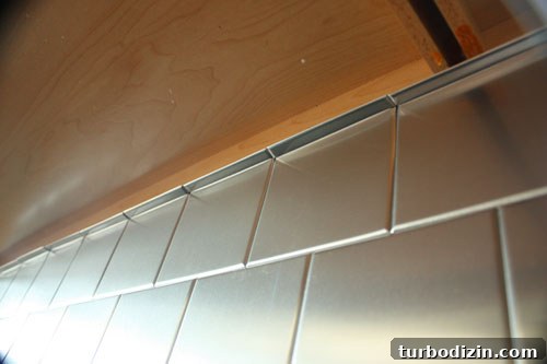 DIY Stainless Steel Stick-On Backsplash for $100 or Less 5 Backsplash after 3