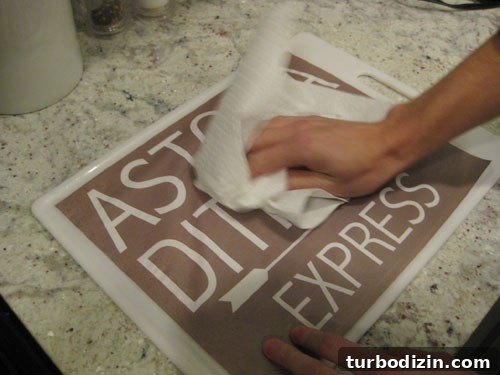 DIY Vintage Wall Signs with Wood and Paper: Step-by-Step Guide 8 Rubbing paper towel on wet print