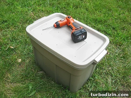 compoststep8 completed diy compost bin in plastic container with holes in top