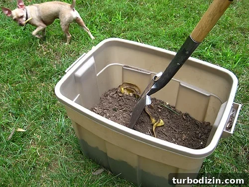compoststep6 stirring compost bin with shovel
