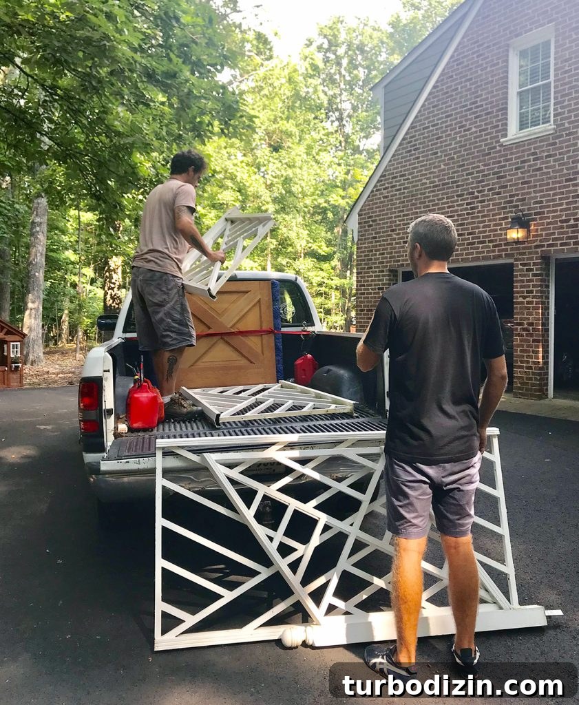 5 Ways to Transport Oversized Items That Don’t Fit in Your Car 4 John loading large railings into a pick-up truck