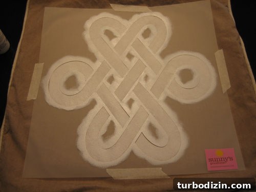 Stencil a Pillow or Curtain Panel: Step-by-Step Guide for DIY Home Decor 3 Close-up of knot stencil on fabric