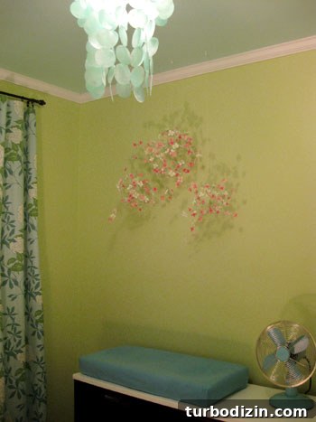 DIY Faux Flower Mobile Tutorial for a Charming Nursery Decor 9 Orbs above dresser
