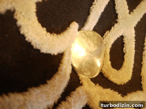DIY Ottoman Build: Step-by-Step Guide to a Stylish Upholstered Footstool 12 finished tufted button
