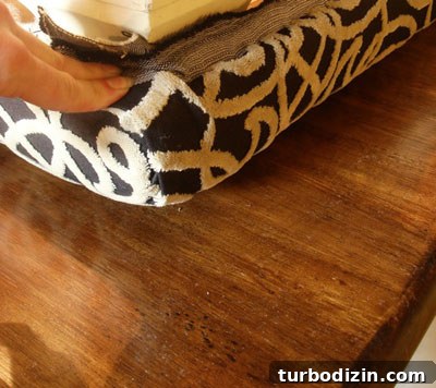 DIY Ottoman Build: Step-by-Step Guide to a Stylish Upholstered Footstool 6 stapled corner