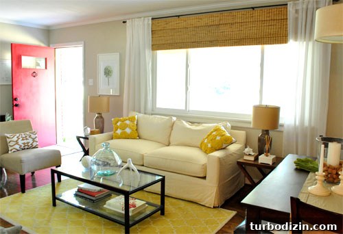 Weekly Steal: Bold Pinwheel Throw Pillows 2 Yellow ruffled pillow on sofa