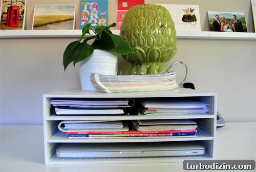 Home Office That Converts Into a Comfortable Guest Room 4 Laptop stored in cubby to free space