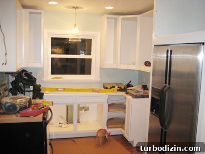 Why Our Kitchen Cabinets Give Major Mariah Carey Vibes 3 Cabinet installation progress