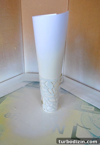 Cups after white spray on the outside