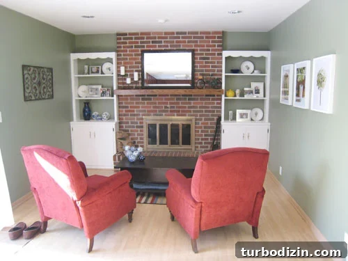 After: cozy hearthroom painted in olive green with built-ins and fireplace