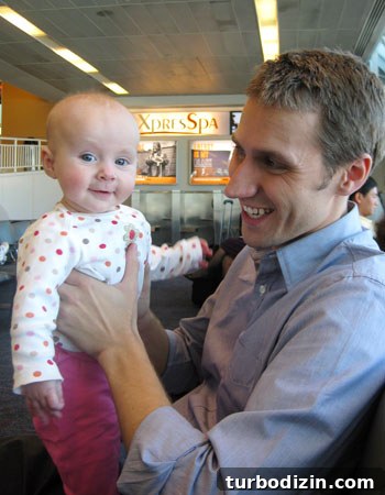 Meeting Nate Berkus: The Moment That Made Our Year 17 Baby smiling at the airport