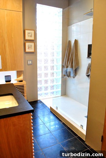 Historic Meets Modern Home Tour: Inside a Stunning Renovation 11 Glass block panel and glass shower