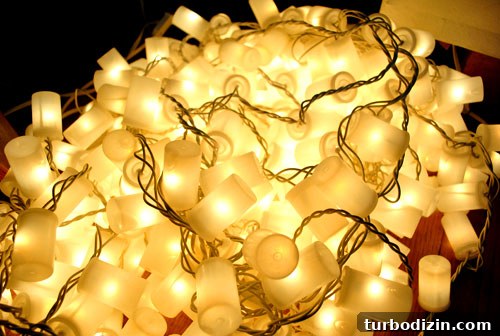 Historic Meets Modern Home Tour: Inside a Stunning Renovation 14 DIY light installation made from film canisters