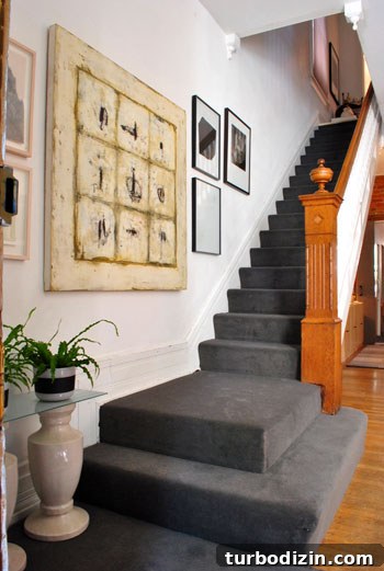 Historic Meets Modern Home Tour: Inside a Stunning Renovation 6 Staircase and high ceilings