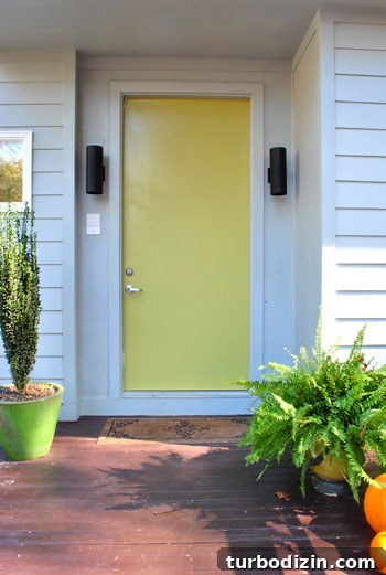 Freshly painted door and stained deck