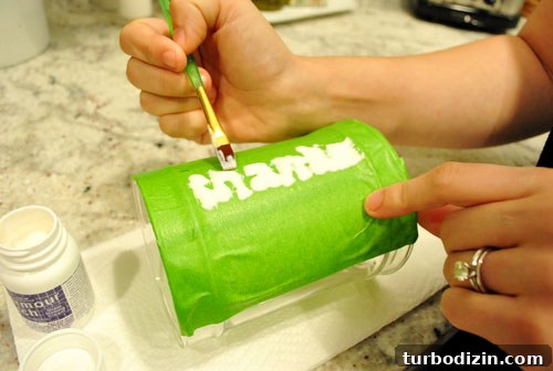 Thanksgiving Thanks Jar Craft: DIY Glass Gratitude Gift 8 Applying glass etch cream to the side of glass apothecary jar for Thanksgiving craft