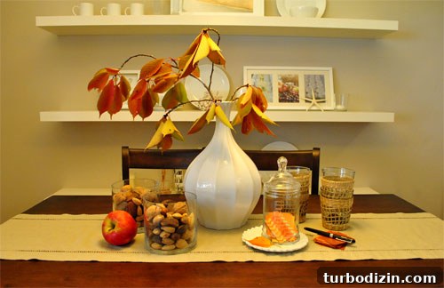 Cherry branches in a vase on dining table