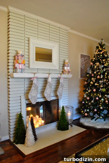 DIY Faux Christmas Presents for a Cozy Mantel Display 7 Candles and tree lights