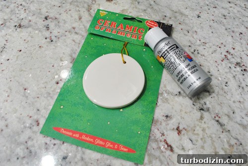 Baby’s First Christmas Silhouette Ornaments: Step-by-Step Guide 2 Silver ceramic ornament and baby silhouette supplies