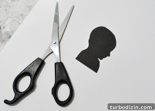 Baby’s First Christmas Silhouette Ornaments: Step-by-Step Guide 3 Cutting out silhouette
