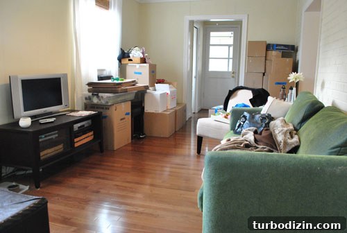 Den With Furniture Packed To Move Into Moving Truck
