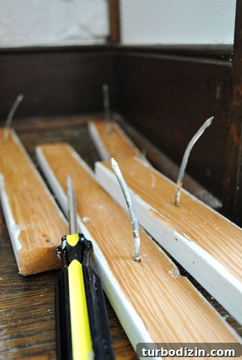 How to Remove Wall Shelves and Patch Spackle Holes 4 Wall damage
