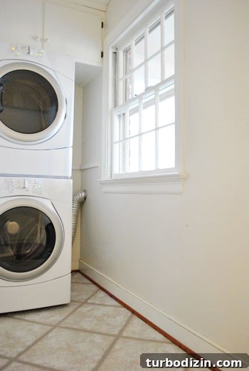 Why We Chose the Whirlpool Duet Stackable Washer and Dryer 5 Washer and dryer in laundry area