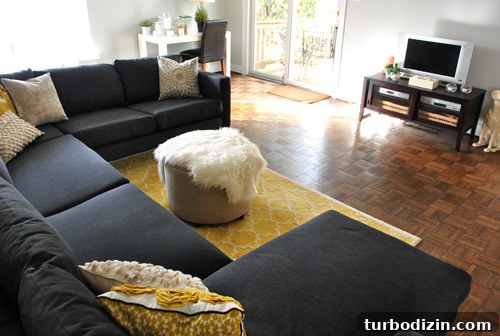 How We Assembled the IKEA Karlstad Sectional Sofa Step-by-Step 6 dark charcoal gray ikea sectional sofa in living room with yellow accents