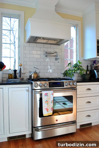 Crisp and Classic House Tour: Timeless Home Design Ideas 5 Range hood and pot filler