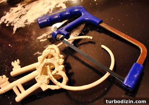 How to Paint and Hang Large Metal Keys on Your Wall 4 Cutting the iron ring to separate keys