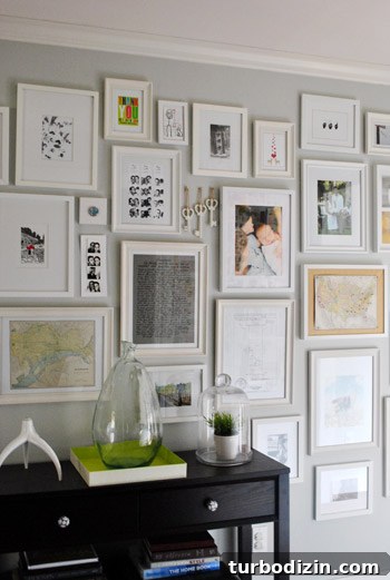 How to Paint and Hang Large Metal Keys on Your Wall 6 Three white keys on the wall