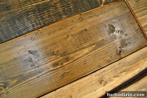 Make New Wood Look Aged: Simple Techniques for Authentic Patina 7 distressed wood look created by hitting bag of screws on whitewood and then staining dark