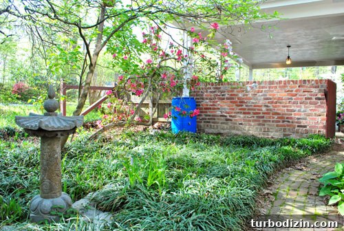 Install a Rain Barrel: Step-by-Step Guide for Your Garden 11 Barrel and garden area